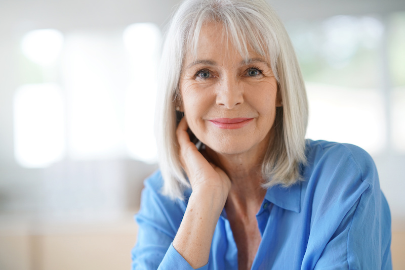 Portrait of senior woman with blue shirt Portrait of senior woman with blue shirt